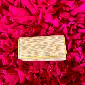 LOUIS VUITTON EPI Yellow 4 ring key holder.